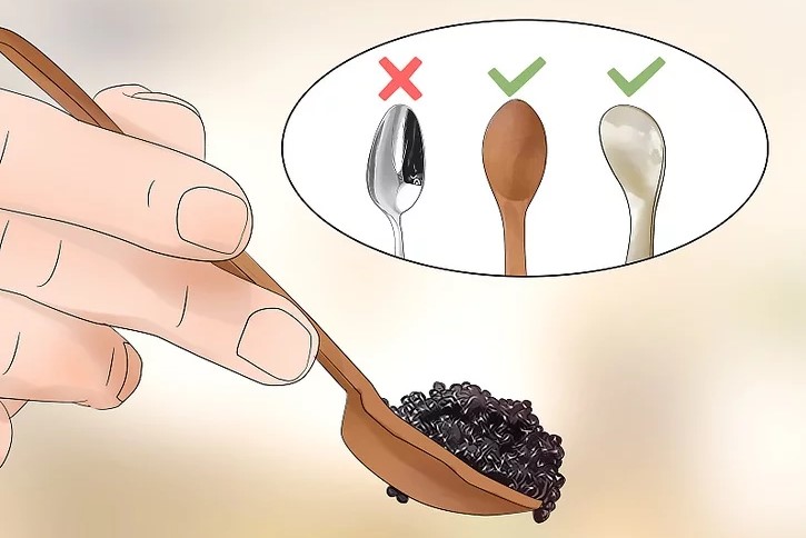 black caviar on a spoon